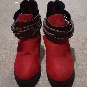 Red zip up high heels